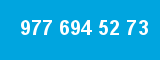 977 694 52 73